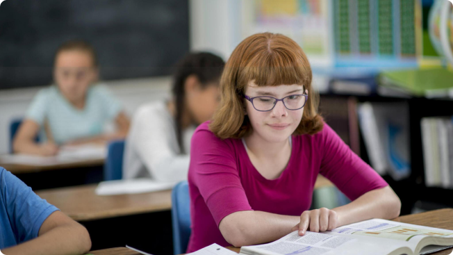 Student with an open text book